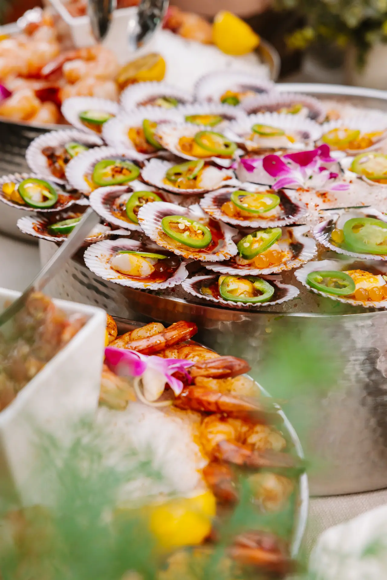 Seafood and scallop crudo with orchids at CALA